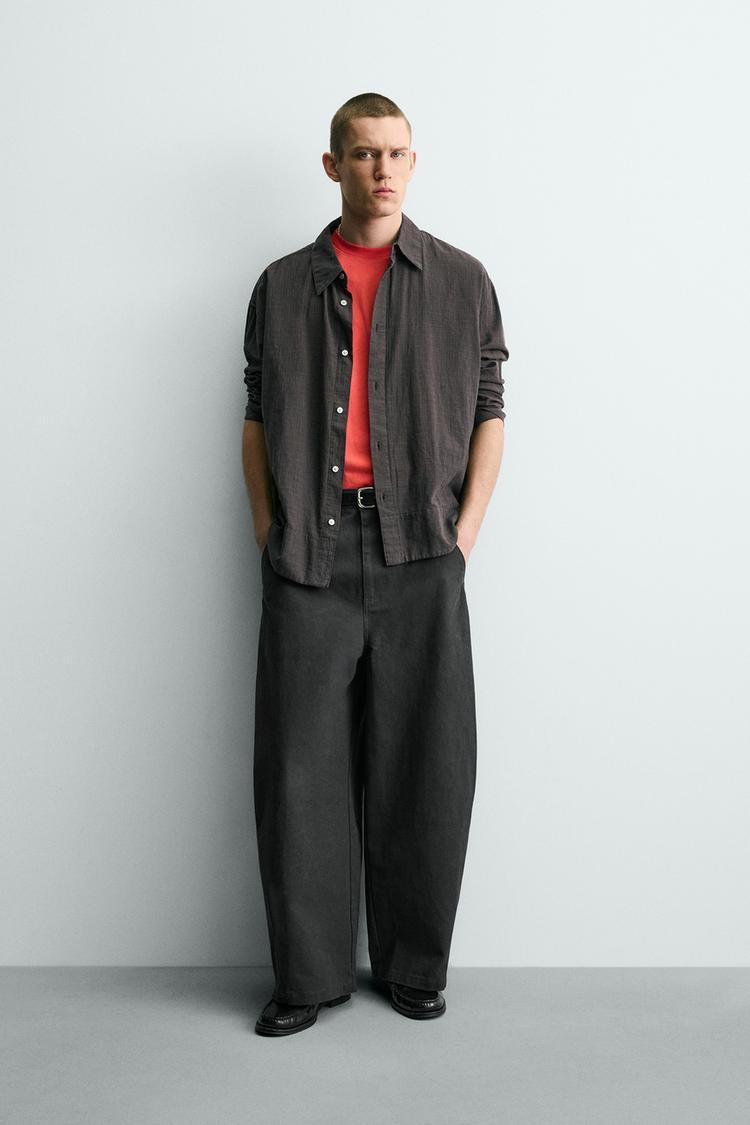 RELAXED FIT PANTS WITH TWISTED SEAM - Zara product image