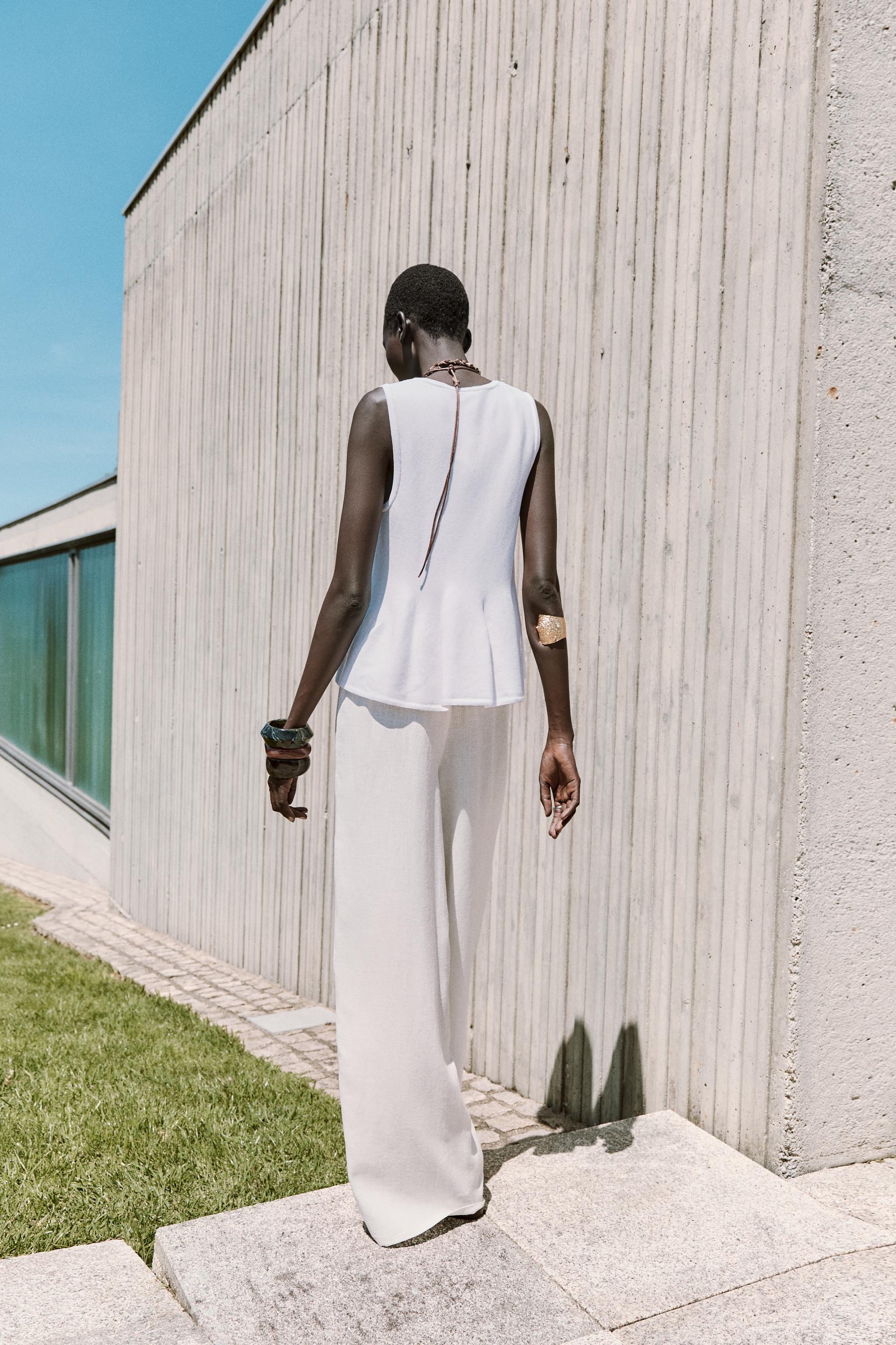 TOP EN MAILLE PÉPLUM