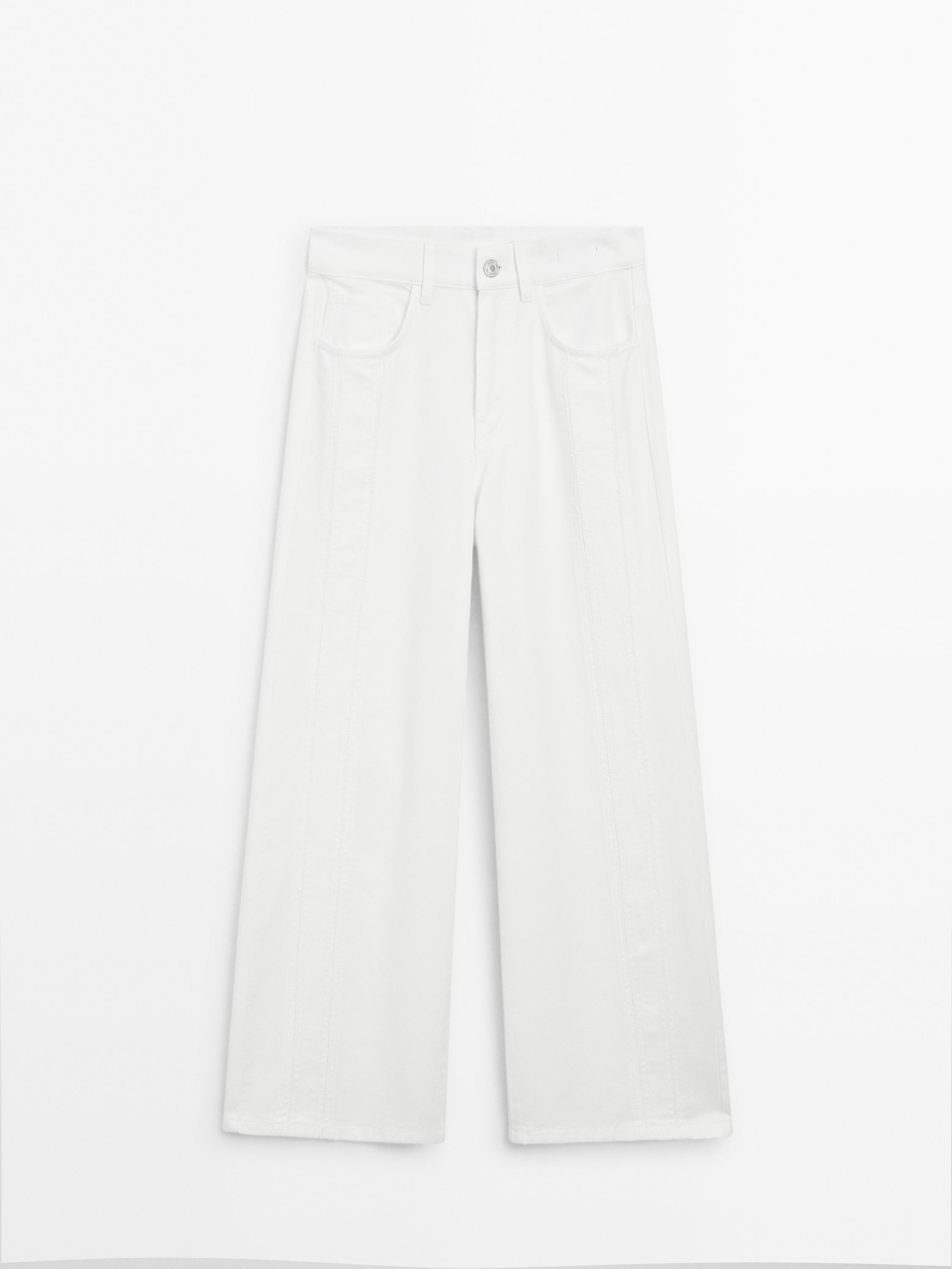 Jean wide leg taille haute avec découpes