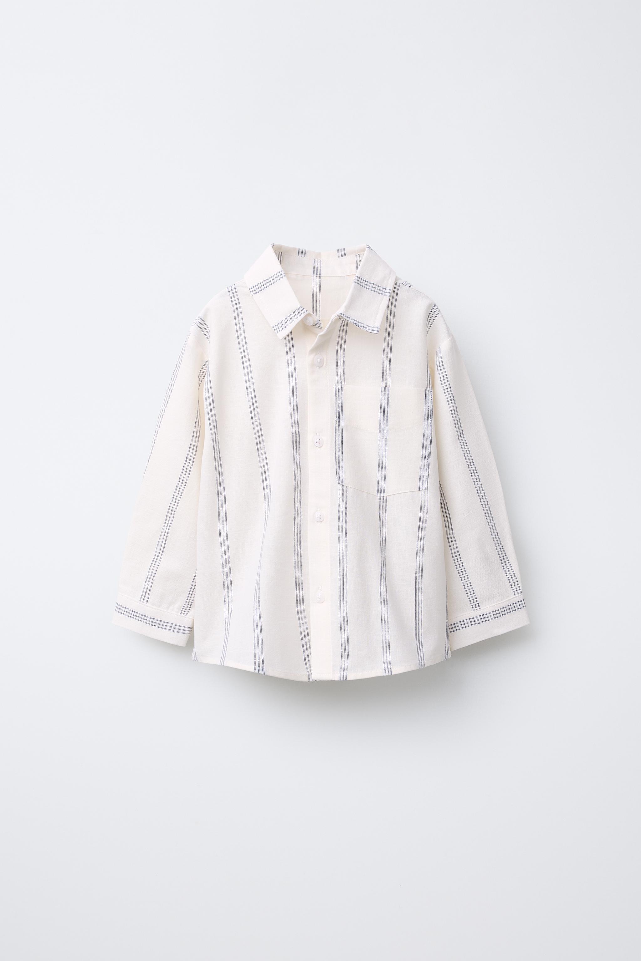 CHEMISE À RAYURES AVEC ÉTIQUETTE