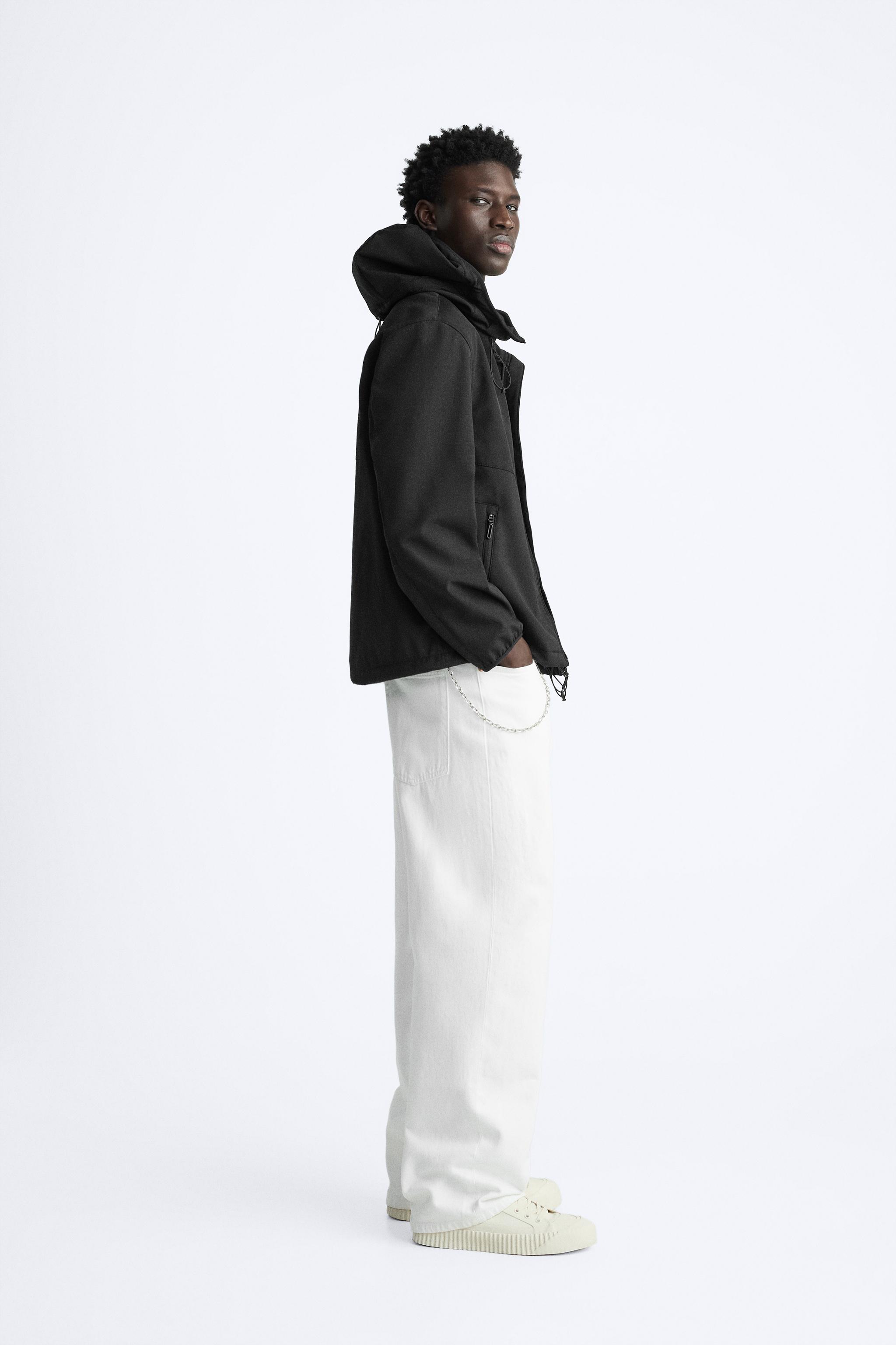 HOODED TECHNICAL JACKET