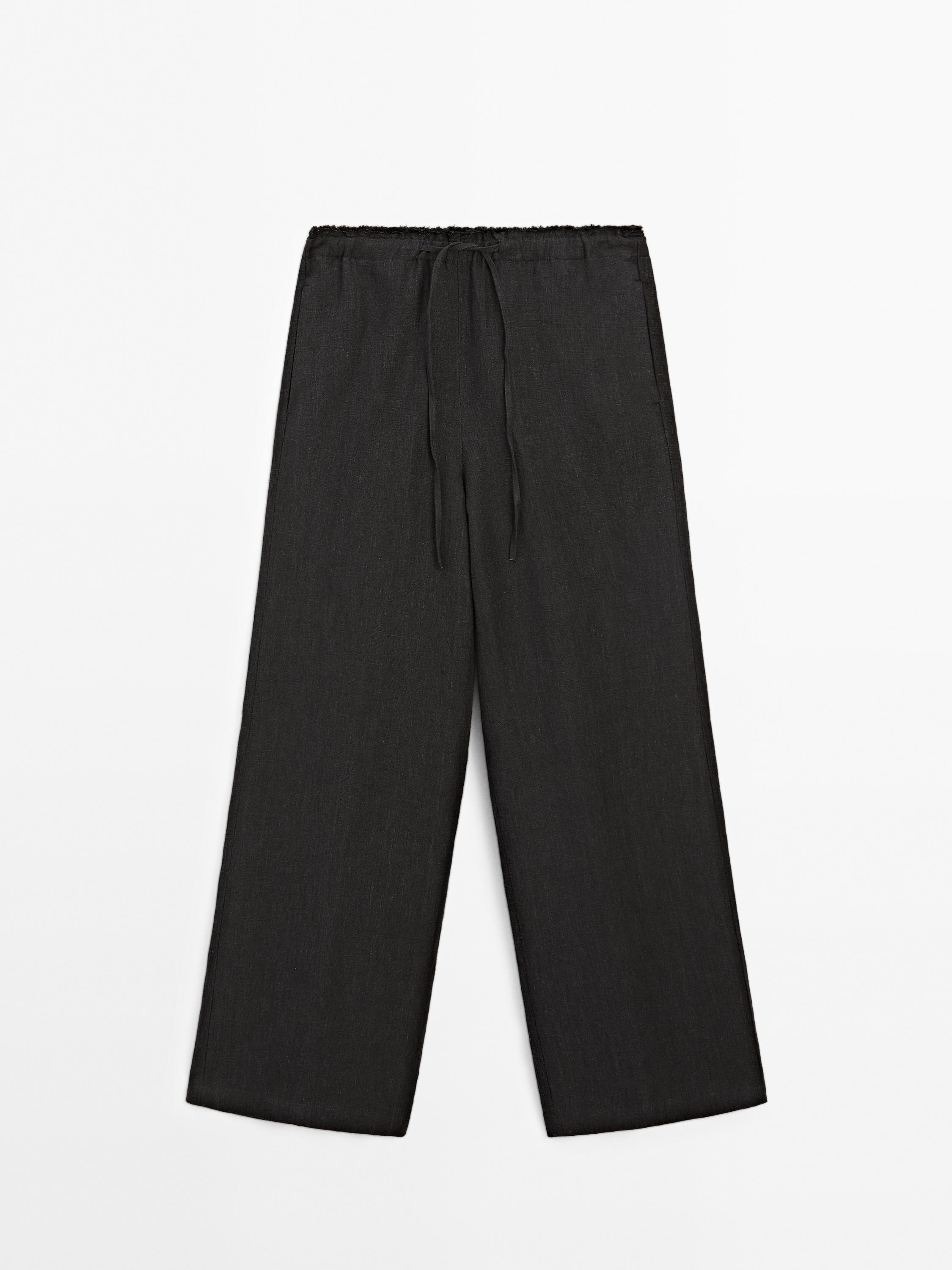 Pantalon de tailleur effiloché en lin