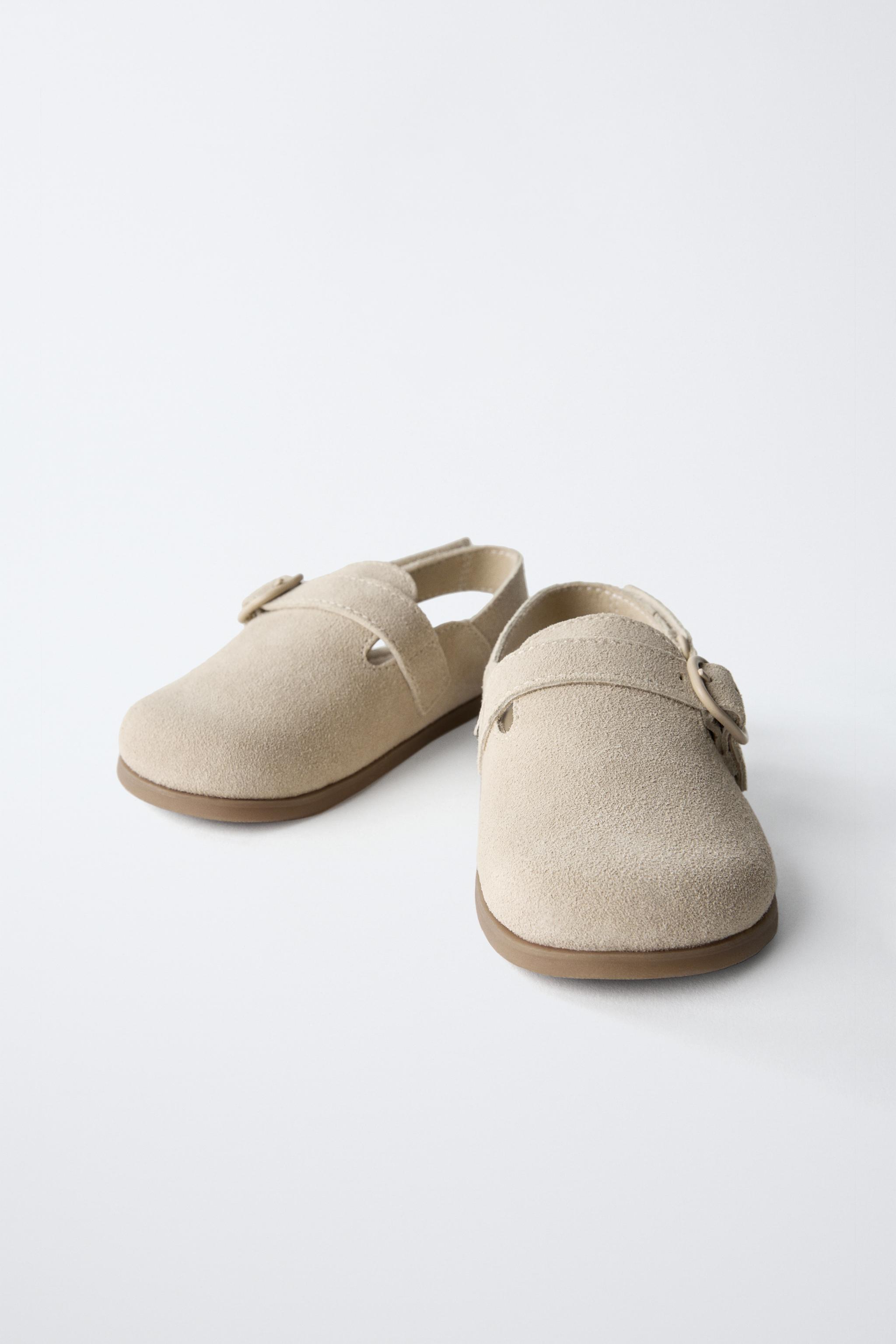 SABOTS EN CUIR