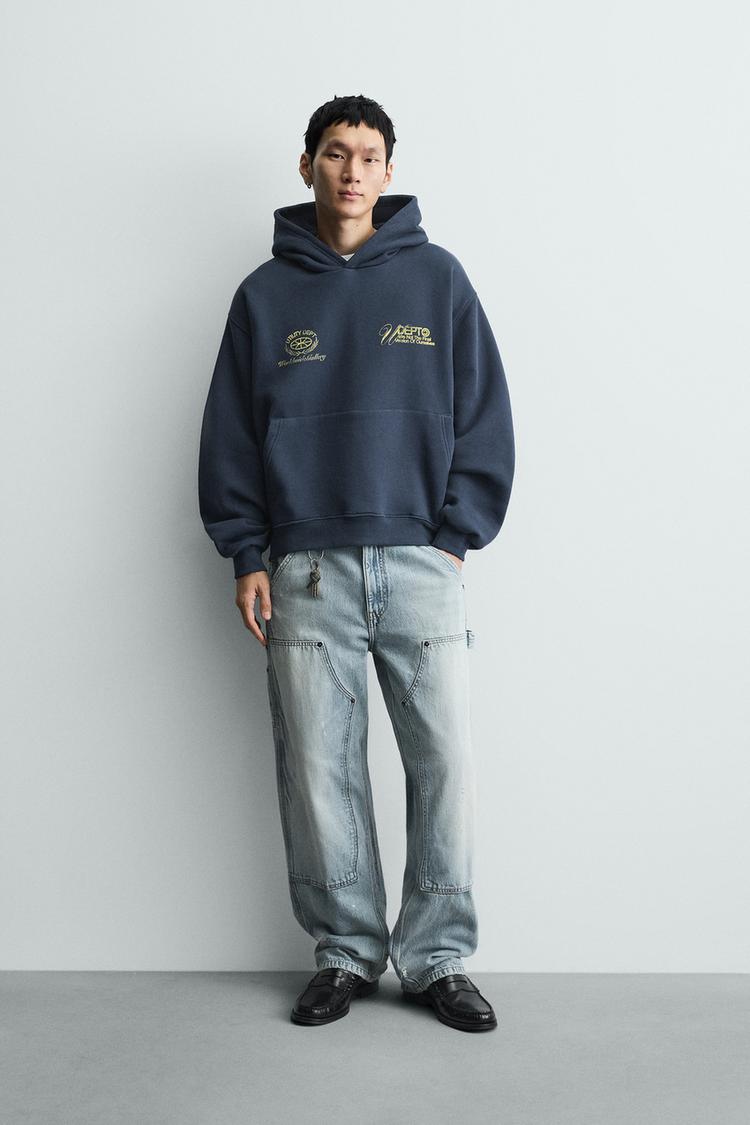 WASHED PRINTED TEXT SWEATSHIRT